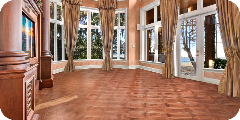 Pallmann Wood Floor Products used in an empty dining room surrounded by windows